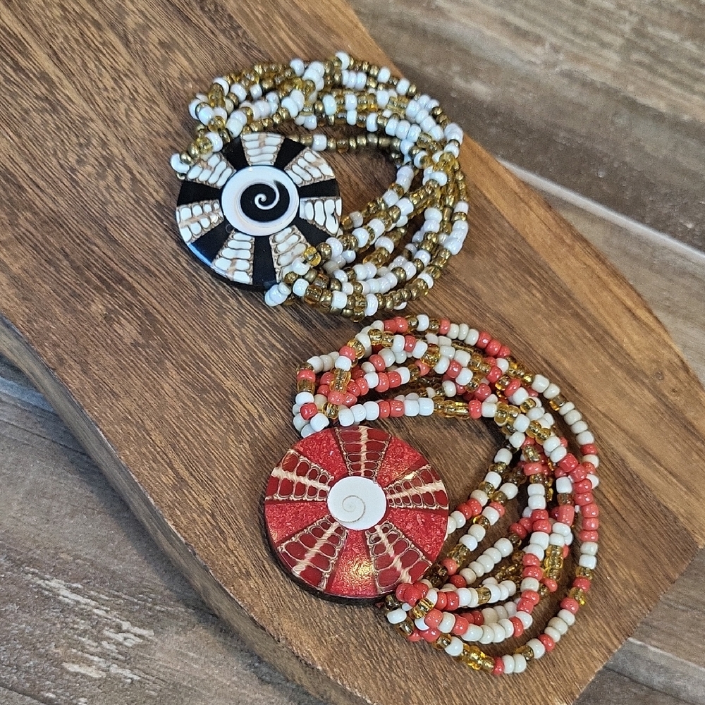 Shiva Shell Eight Strand Stretchy Beaded Bracelets